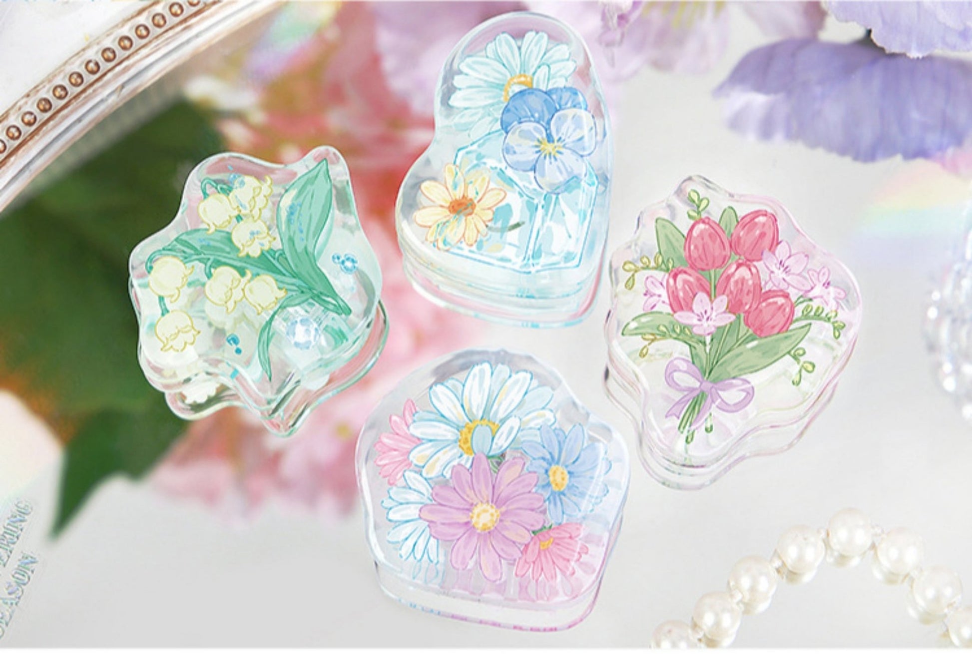 Four Floral Acrylic Binder Clips with with pastel flower designs