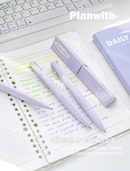 Three Purple Pen Body Multicolor Gel Ink Pen on the Notebook