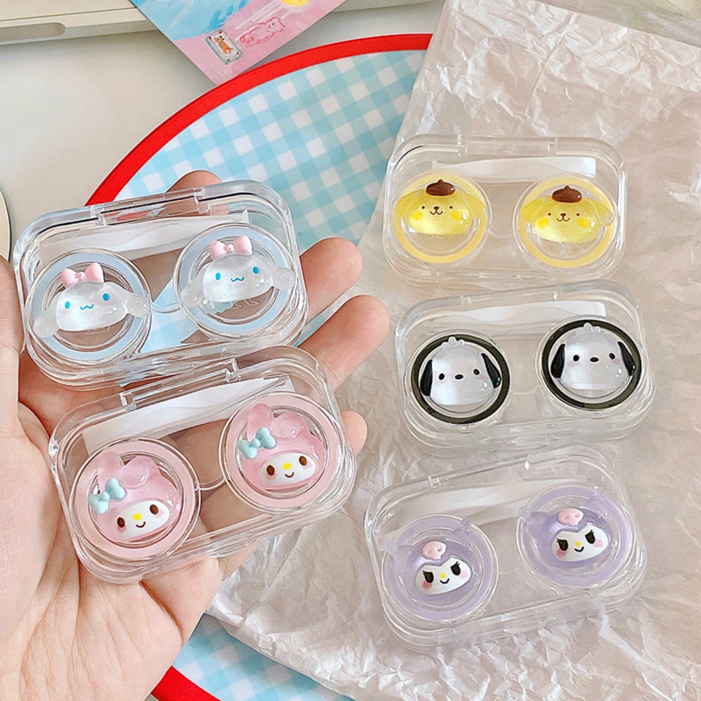 Close up of Cute Sanrio Contact Lens Case for sale Pompompurin, Kuromi, Cinnamoroll, My Melody, and Pochacco